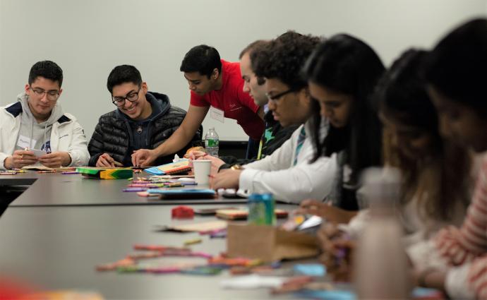 Students participating in an activity during a leadership workshop